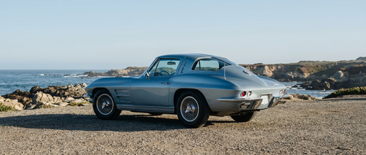 1963 Corvette Sting Ray split-window coupe parked at a coastal overlook