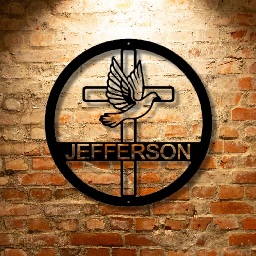 Metal emblem mounted on brick wall featuring a dove and cross, with "Jefferson" written below.