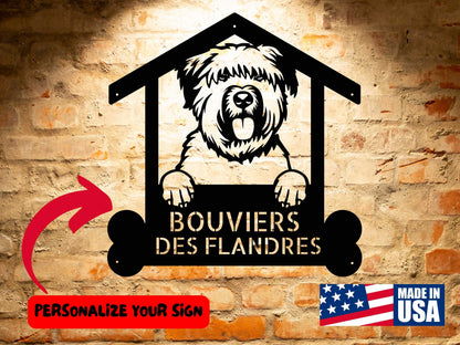 Metal sign in the shape of a doghouse with a Bouvier des Flandres cutout and text "BOUVIERS DES FLANDRES" on a brick wall. A label reads "PERSONALIZE YOUR SIGN" with an arrow pointing to the Bouvier des Flandres Dog Name Sign, Customized Gift for Bouvier des Flandres Admirers, Personalized Dog Wall Art Decor, making it a perfect personalized gift.