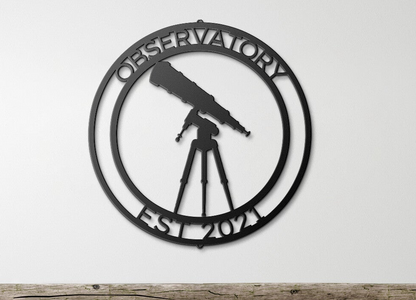 a metal sign that says observatory est 2013