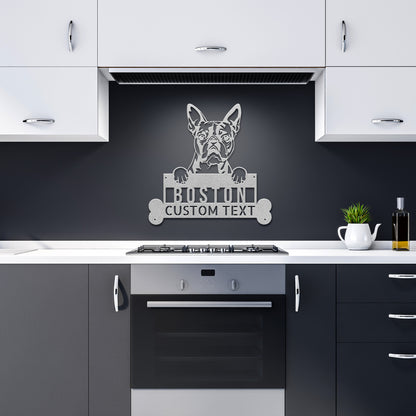 Wall-mounted sign depicting a bulldog holding a customizable text plate, with a "Personalize Your Sign" label and an American flag icon indicating "Made in USA" in the bottom right corner. This Custom Boston Terrier Dog Sign, Personalized Dog Steel Monogram Wall Art, Unique Home Decor, Boston Terrier Lovers Gift brings charm and style to any space.