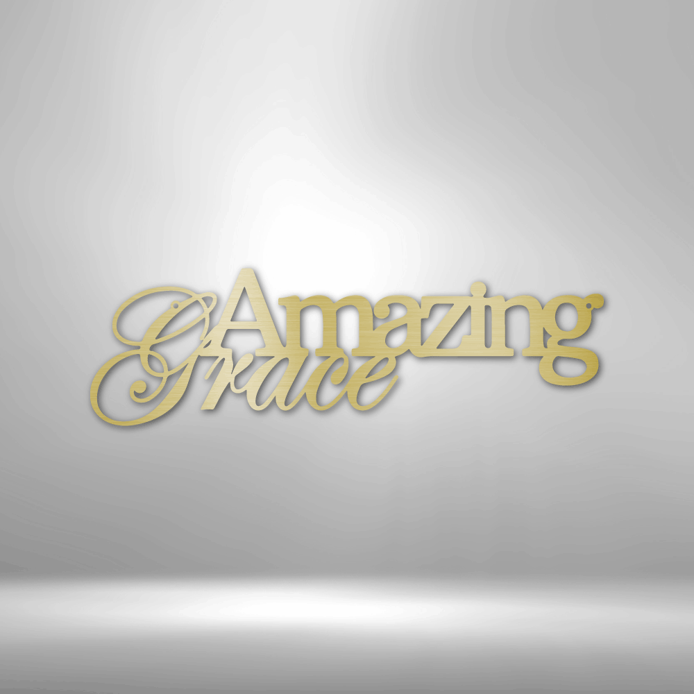 A custom handcrafted steel sign displaying "Amazing Grace" on a brick wall.