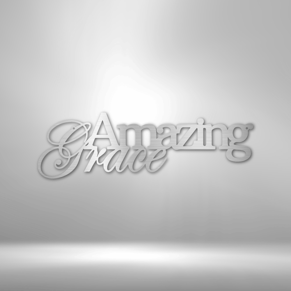 A custom handcrafted steel sign displaying "Amazing Grace" on a brick wall.