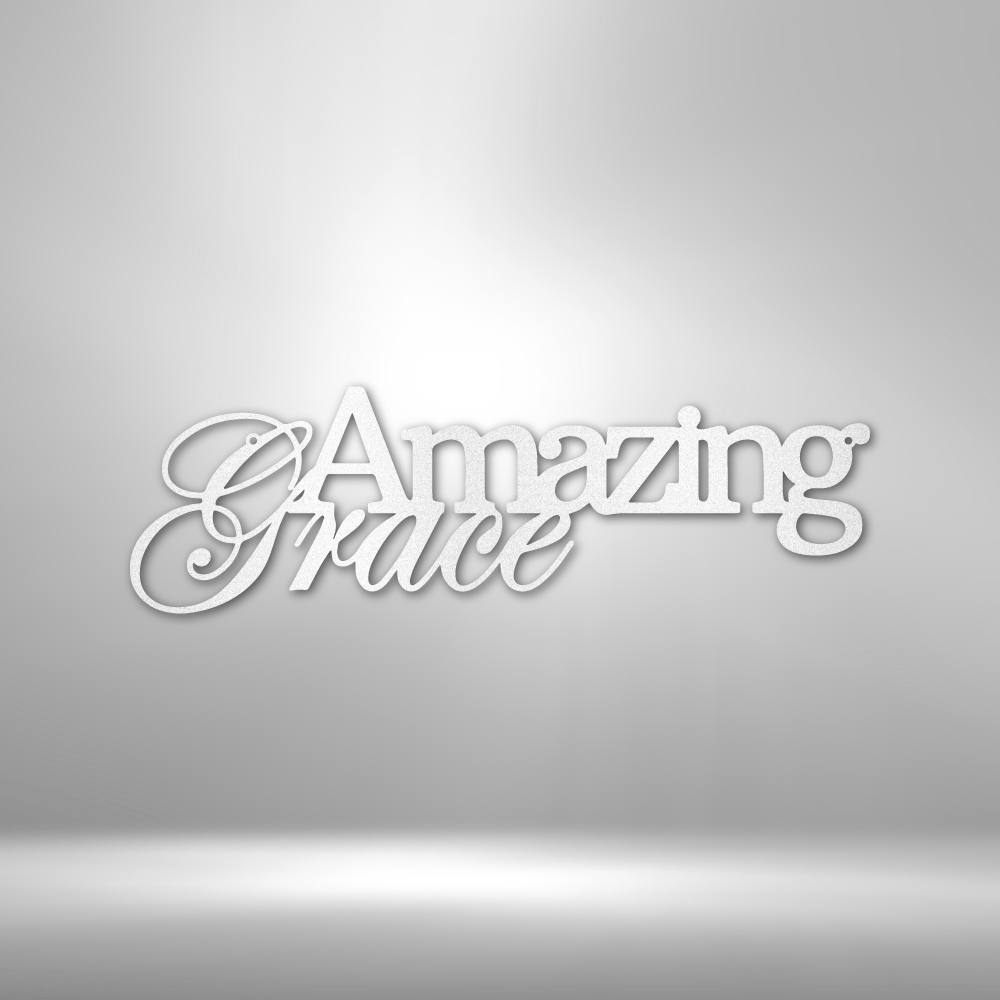 A custom handcrafted steel sign displaying "Amazing Grace" on a brick wall.