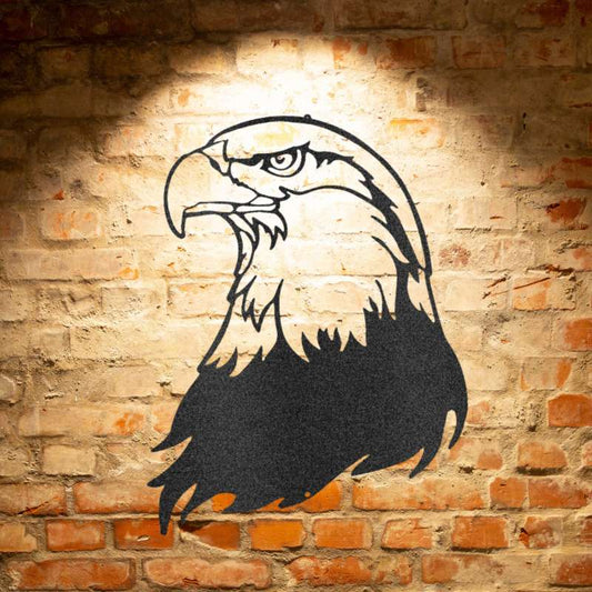 A Metal Wall Art Decor featuring a Bald Eagle Head - Steel Sign on a brick wall.