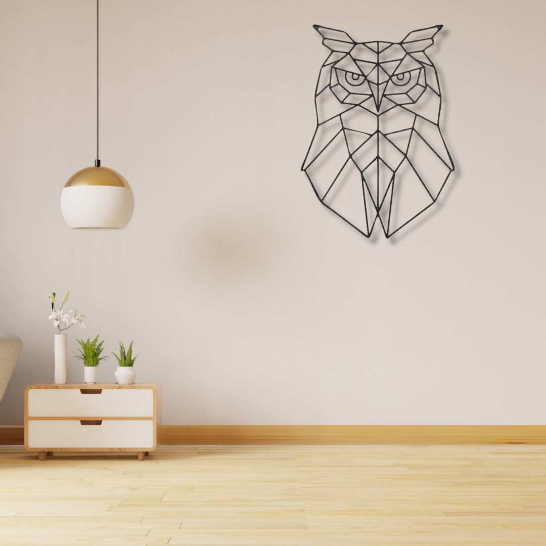 A Geometric Owl Metal Wall Art on a brick wall, perfect as a unique metal art gift.