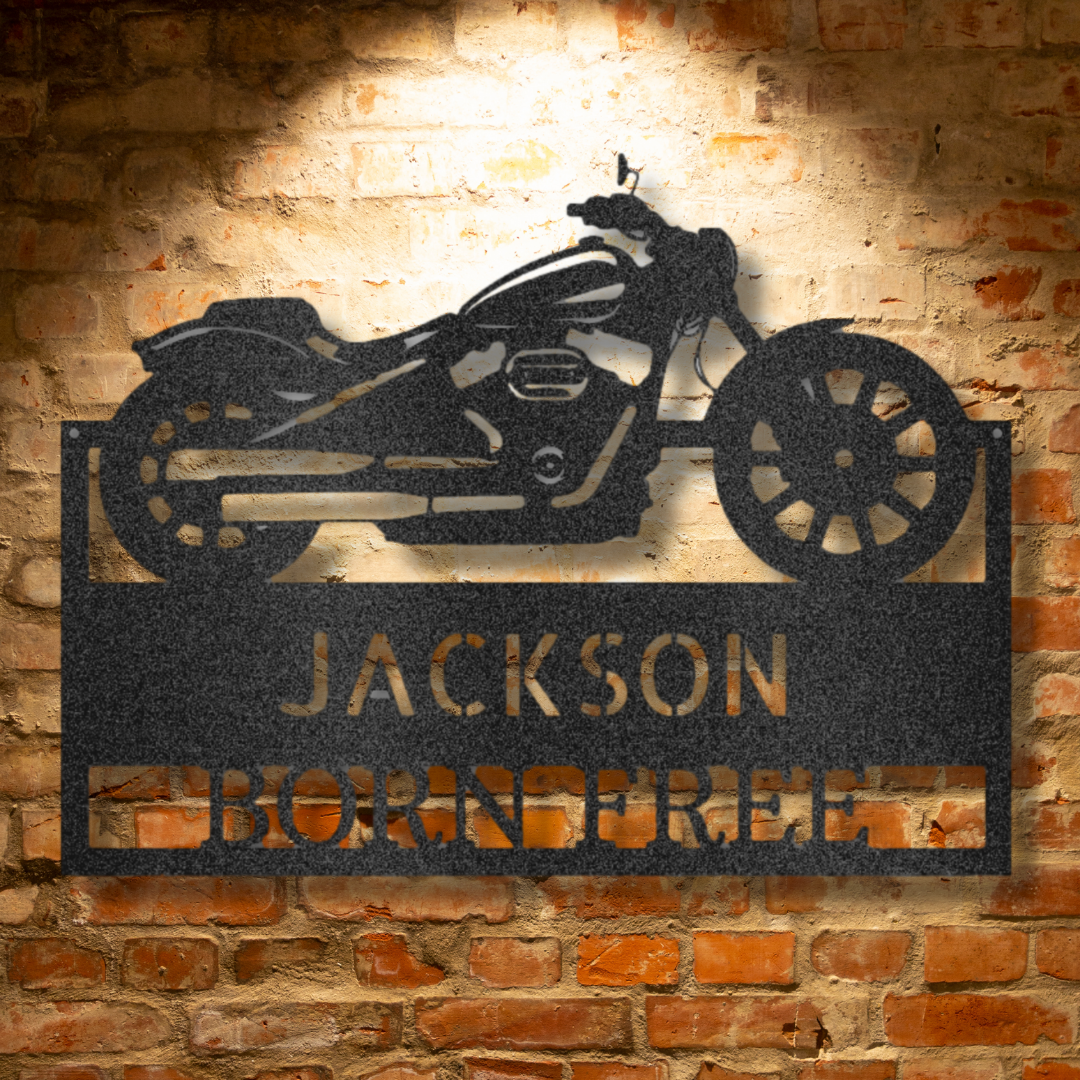 A personalized mechanic metal wall art monogram sign with the name Jackson for a retro garage.