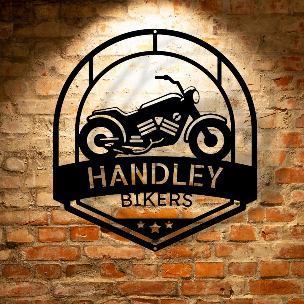 A Classic Car Steel Monogram - Steel Sign that says handley bikers on a brick wall.