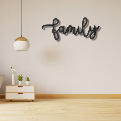 Metal Family Wall Art - The Family Script - Steel Sign is hanging on a brick wall.