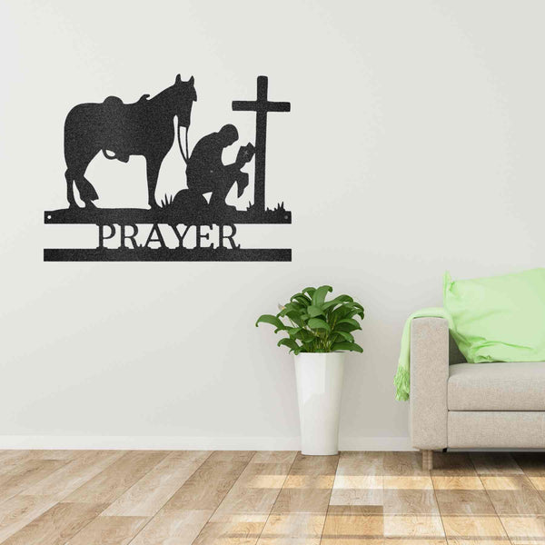 Unique Metal Art Gifts, personalized Family Signs featuring a silhouette of a Kneeling Cowboy Monogram - Steel Sign praying in front of a brick wall.