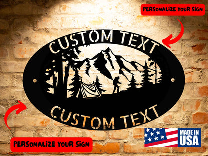 Made from 18-gauge steel, the Custom Hiking Sign - Personalized Hiking Mountain Sign Steel Monogram showcases a mountain and camping scene with arrows directing attention to customizable text areas. Ideal for enhancing interior décor, this sign is proudly labeled "Made in USA.