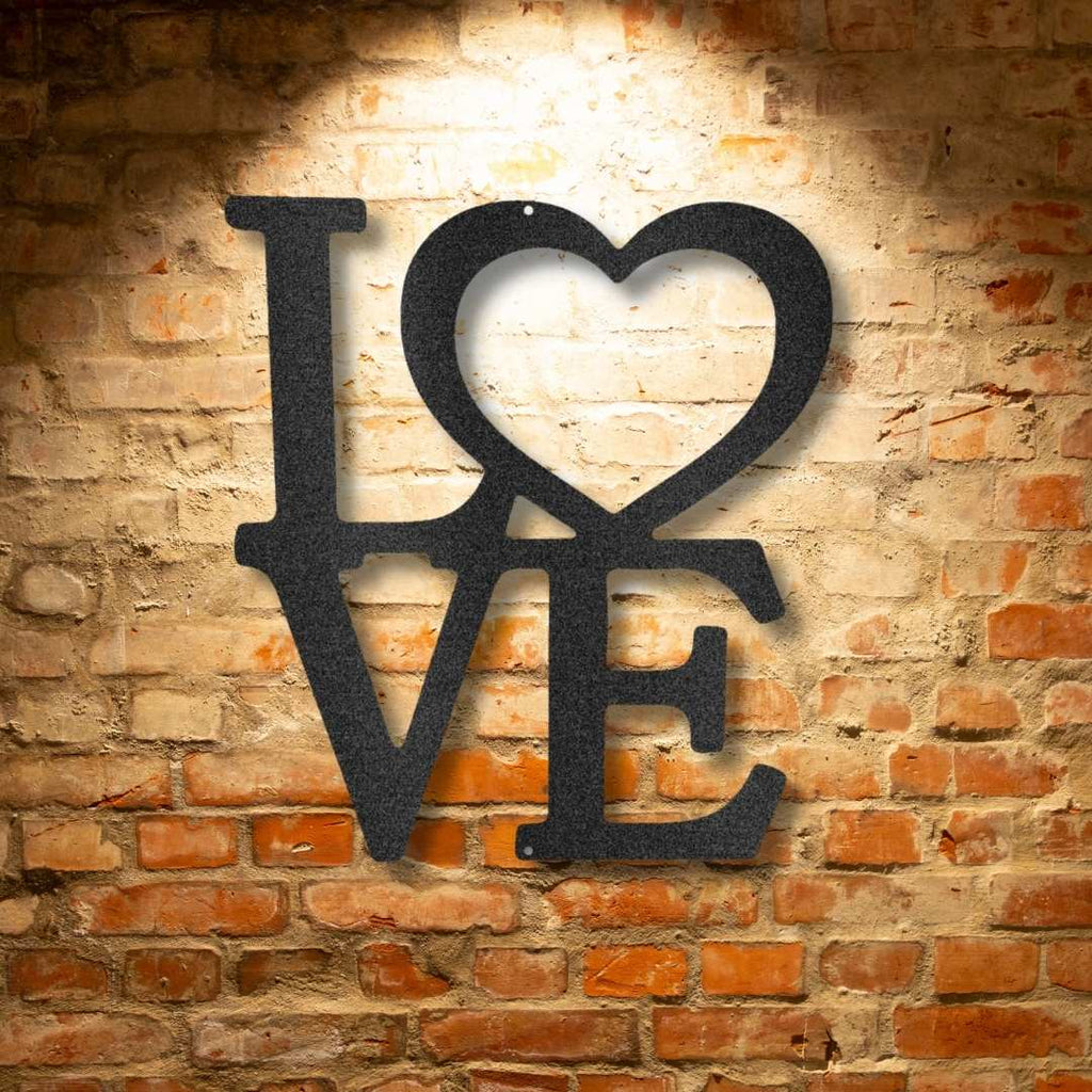 A personalized black metal Classic Love - Steel Sign displayed on a brick wall.