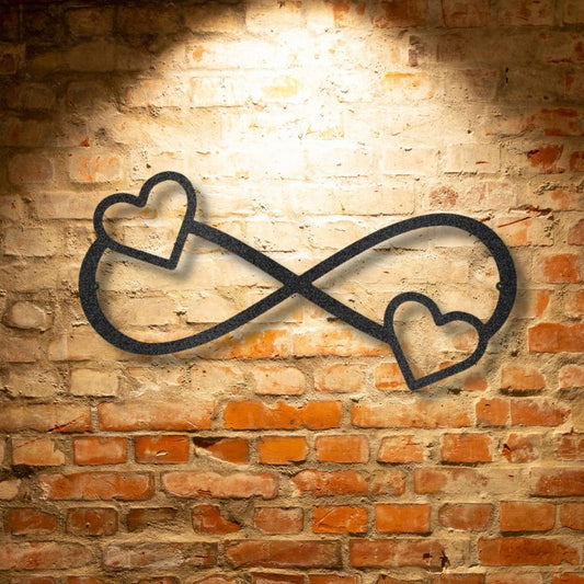 A durable outdoor metal sign featuring a unique double heart infinity design on a brick wall.