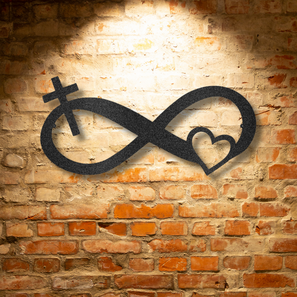 A Durable Steel Sign with a Unique Cross and Heart Metal Art on a Brick Wall.