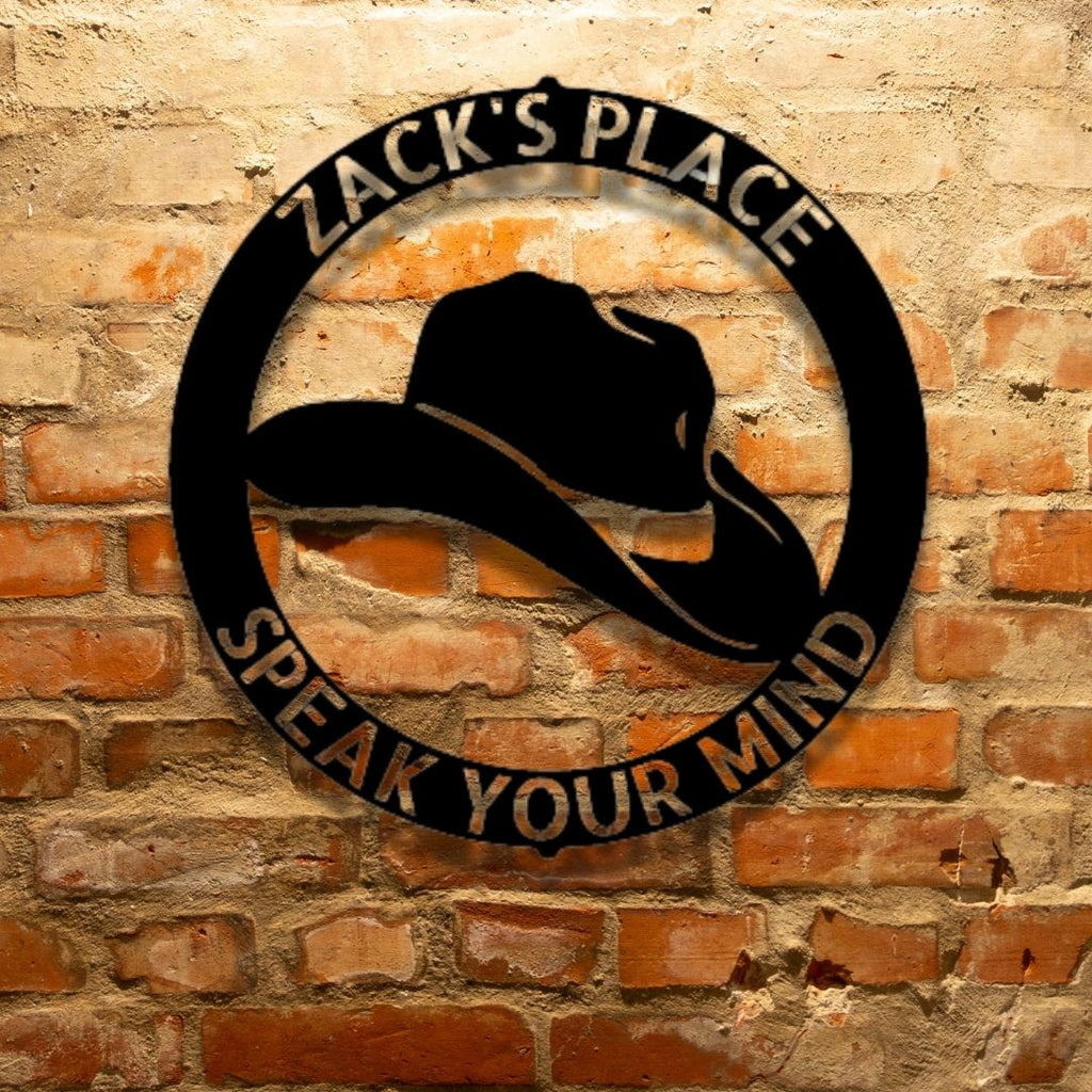 A PERSONALIZED Metal Wall Art Decor - Steel Monogram on a brick wall with the words zac's place speak your mind.