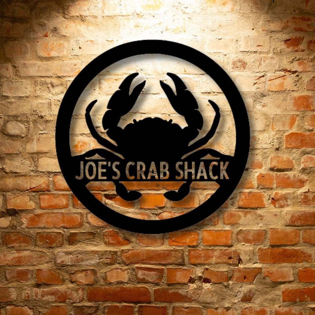 Joe's Unique Metal Art Gifts: Personalized Crab Monogram - Steel Sign on a brick wall.