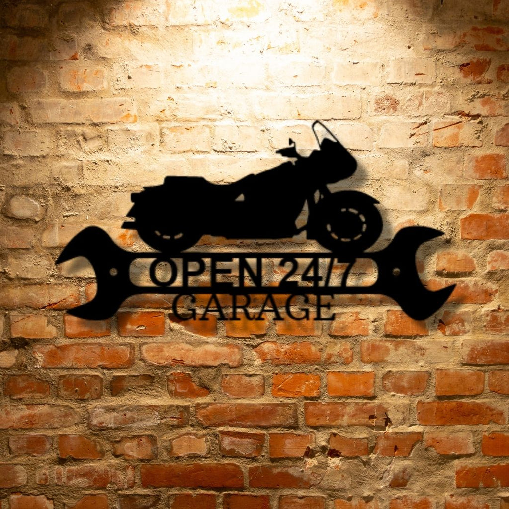A personalized mechanic metal wall art steel sign featuring a wrench on a brick wall.