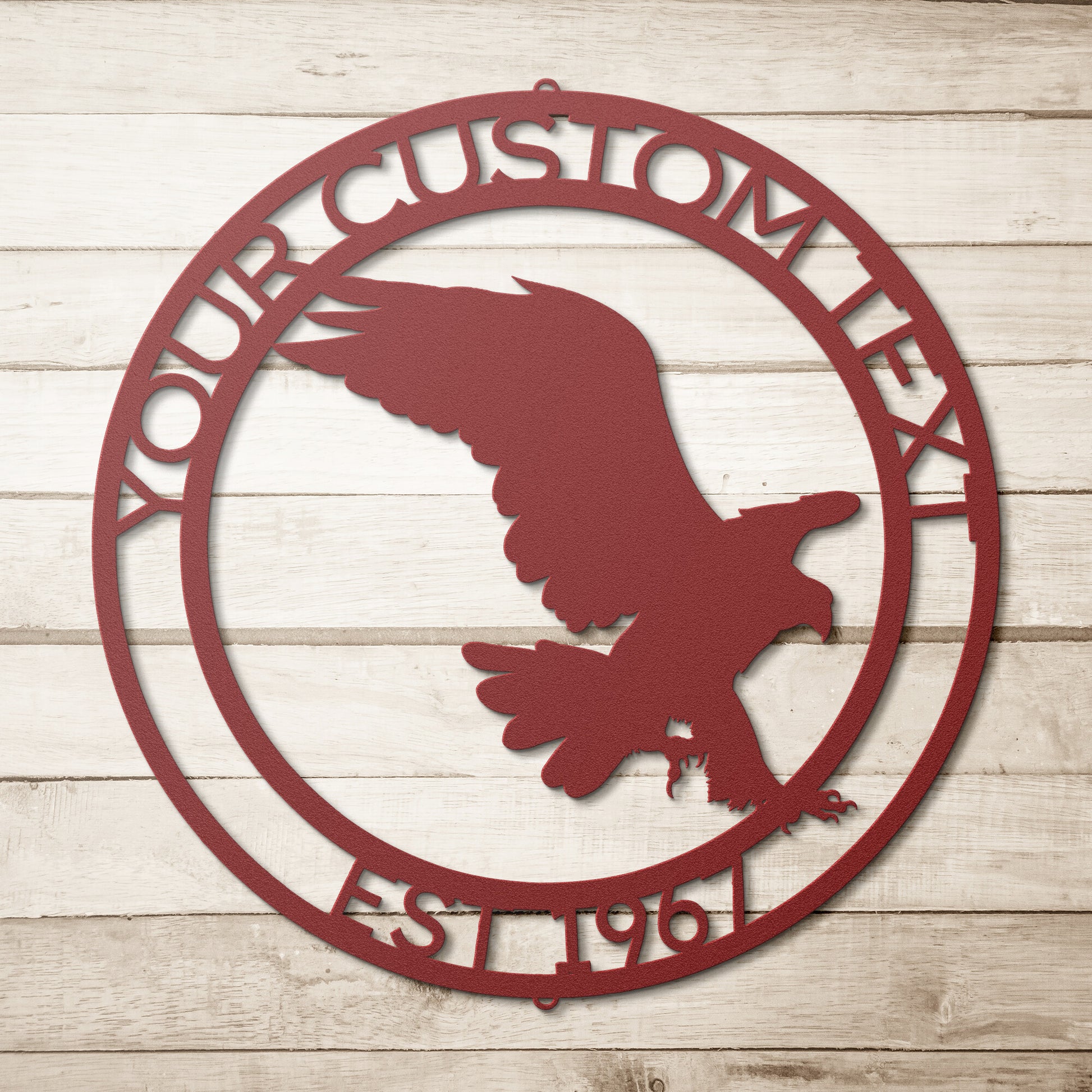 A CUSTOM EAGLE SIGN with an Elegant Family Sign Decor on a wood surface.