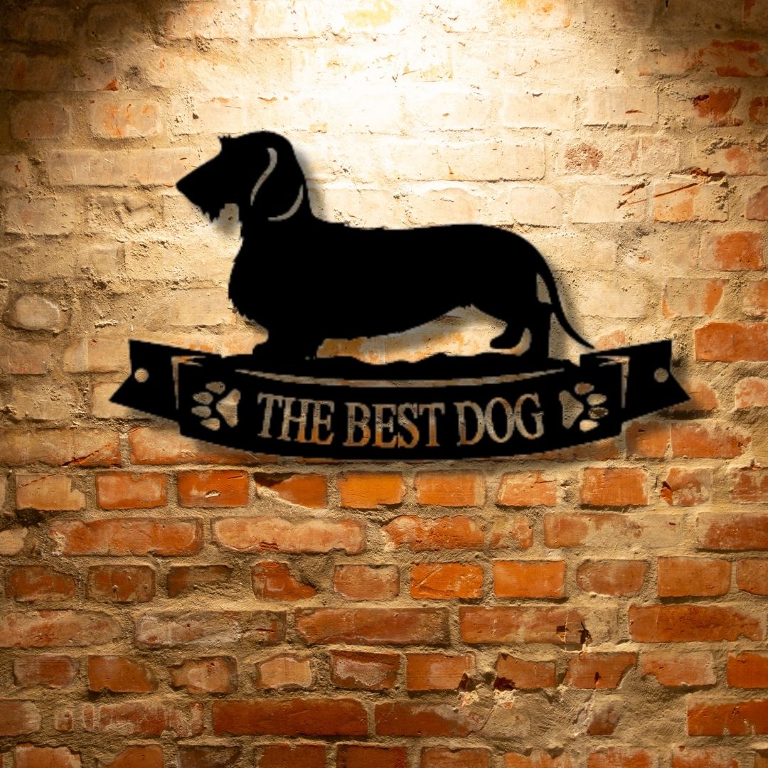 A PERSONALIZED Dachshund Banner Monogram - Unique Metal Art Gifts hanging on a brick wall.