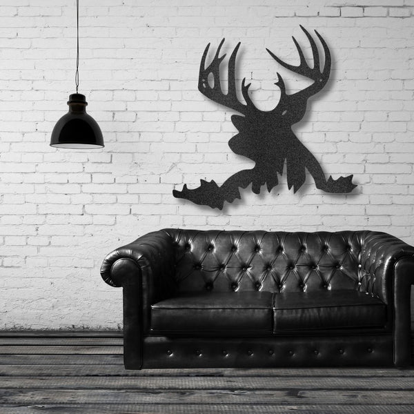 A durable outdoor metal sign featuring a black deer head on a brick wall.