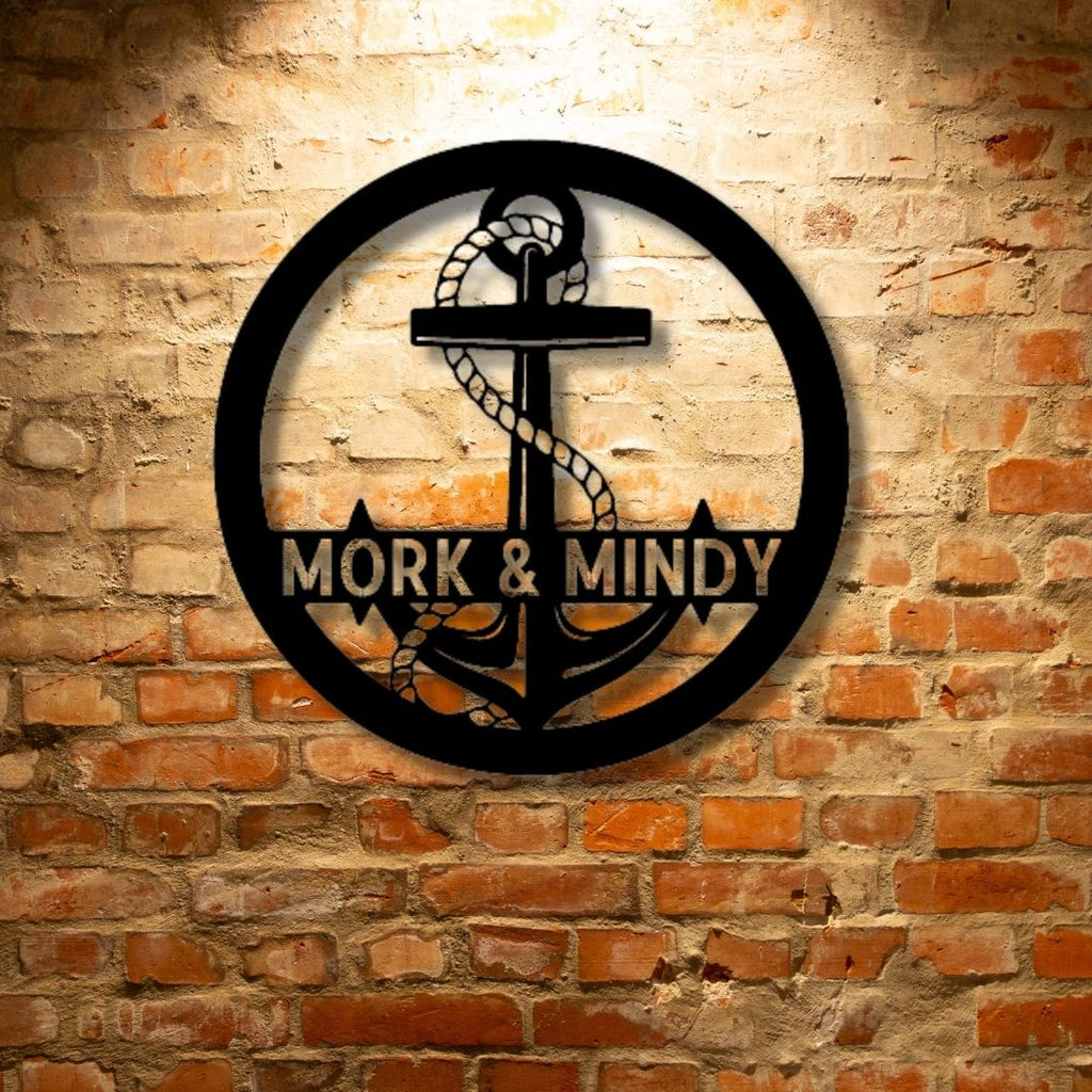 A UNIQUE Custom Handmade Steel Sign featuring a PERSONALIZED monogram of "morg and mindy" on a brick wall.
