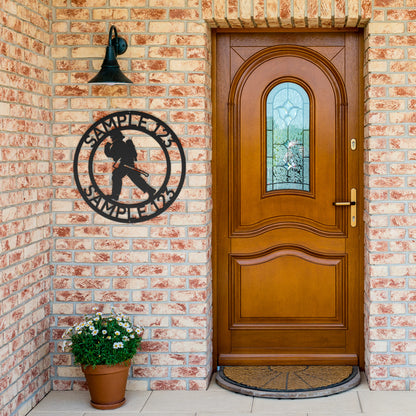 A unique metal art gift - Customized Firefighter Steel Monogram Wall Art Home Décor in a red circle on a wooden background.