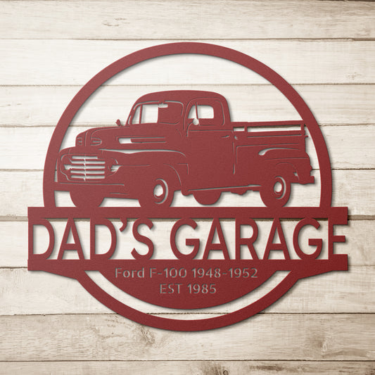 This personalized garage car sign features a vintage Ford F-100 truck with the phrases "Dad's Garage," "Ford F-100 1948-1952," and "EST 1985" on a warm wooden background, adding a nostalgic touch to any space.