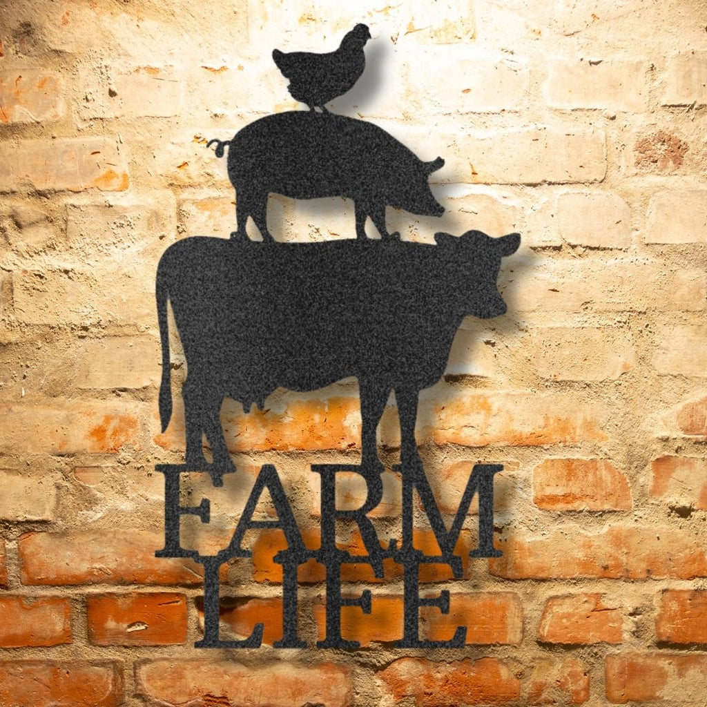 A Fun Metal Wall Art Decor with a pig and cow on top of a brick wall.