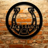 A PERSONALIZED Horseshoe Monogram steel sign with the words zac's ranch, featuring a durable outdoor metal design.