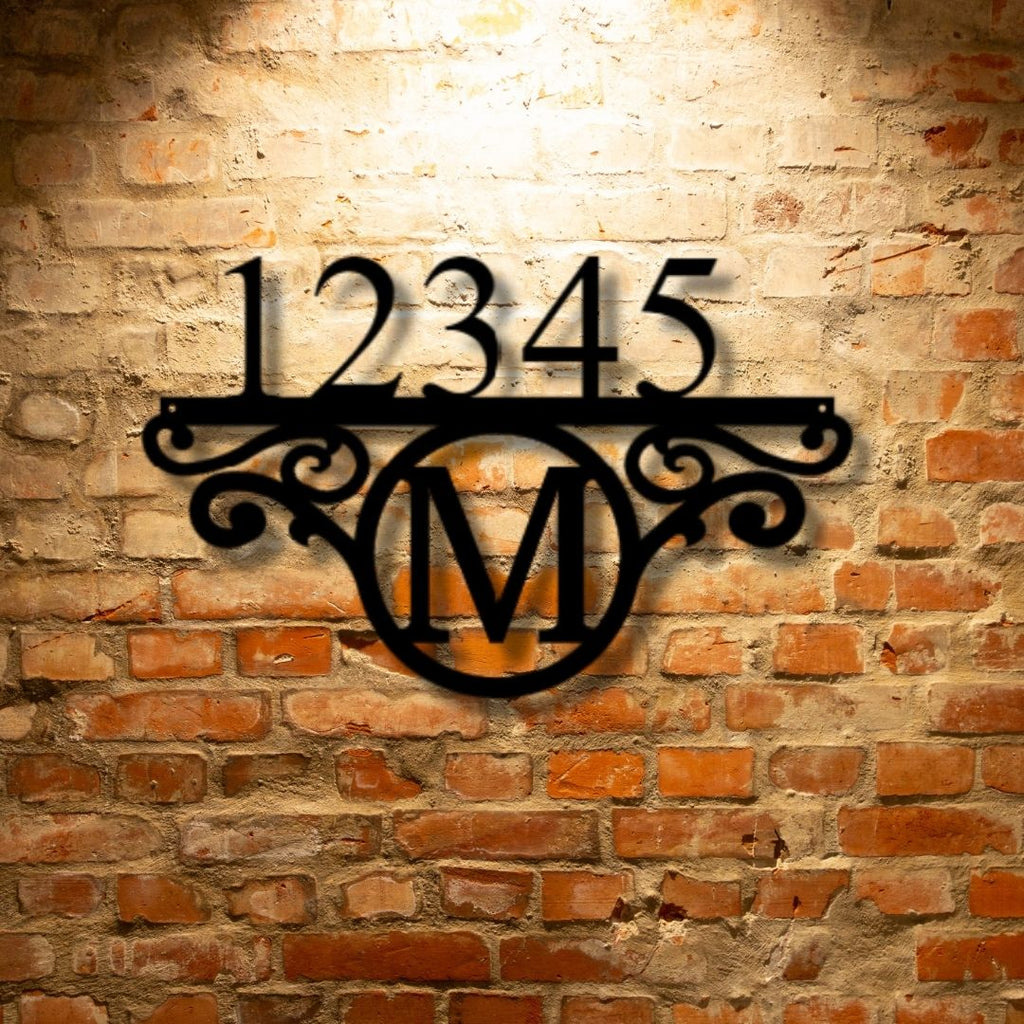 A unique personalized steel monogram adorns a brick wall as metal wall art decor.