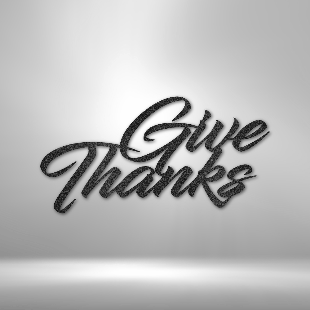 A durable metal sign displaying "Give Thanks" on a brick wall, perfect for outdoor decor.