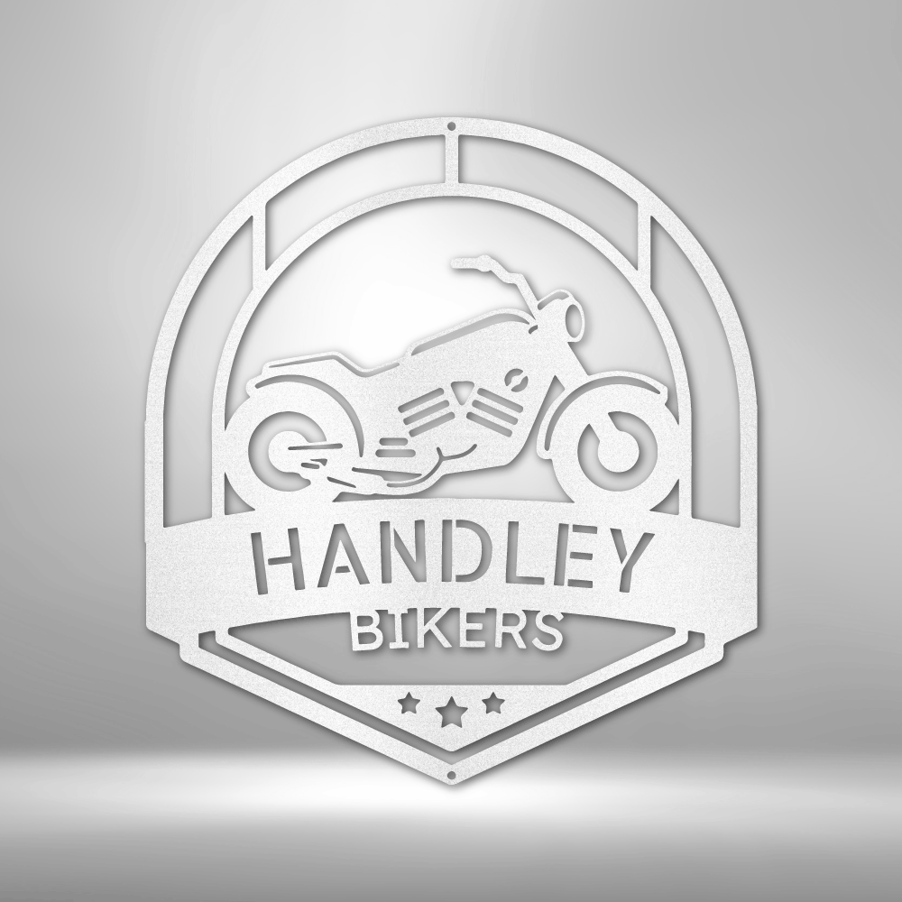 A Classic Car Steel Monogram - Steel Sign that says handley bikers on a brick wall.