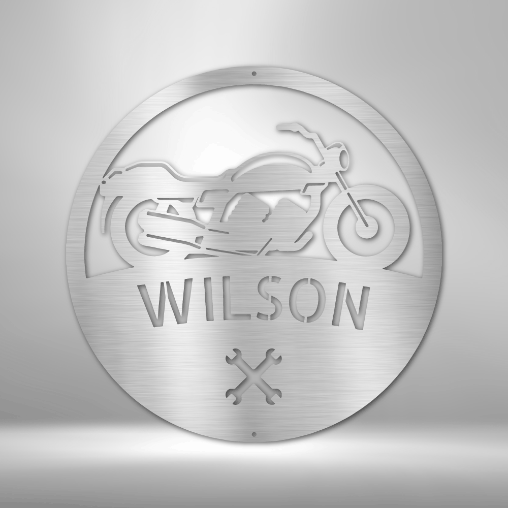 A custom metal Motorcycle Master Monogram steel sign personalized with the name wilson.