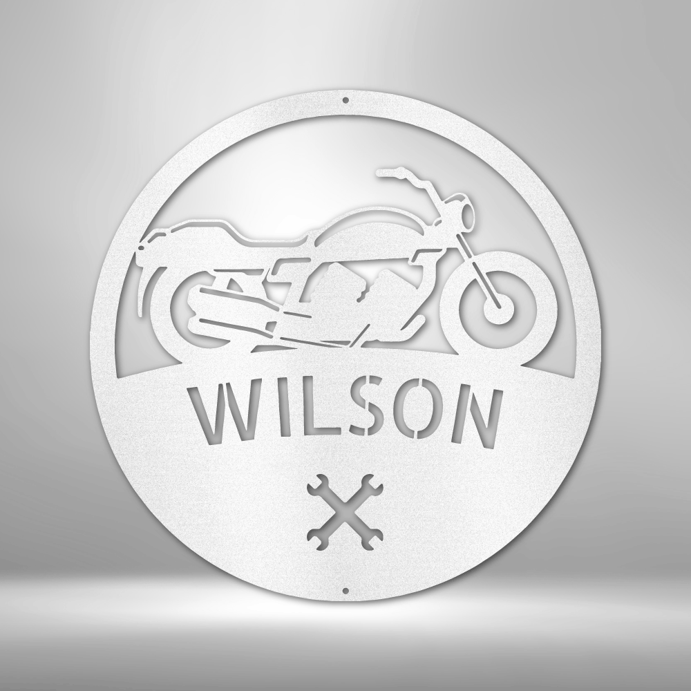 A custom metal Motorcycle Master Monogram steel sign personalized with the name wilson.