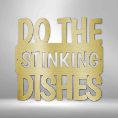 A personalized steel monogram sign, featuring a "Do the Dishes" quote, displayed on a brick wall.