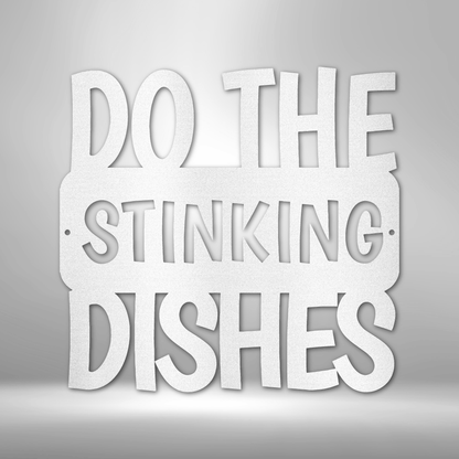 A personalized steel monogram sign, featuring a "Do the Dishes" quote, displayed on a brick wall.