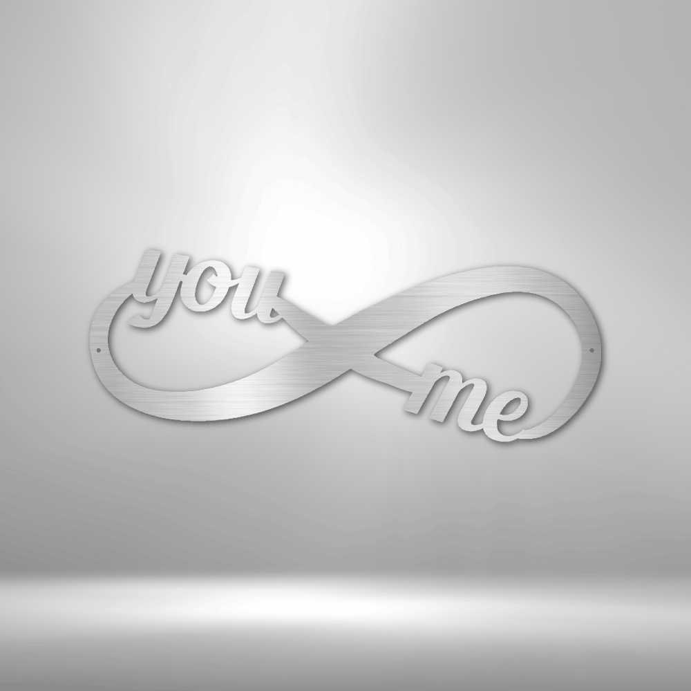 A Personalized Steel Monogram with the words you me on it.