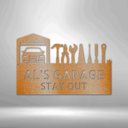 A steel sign with tools on a brick wall, showcasing retro garage decor.