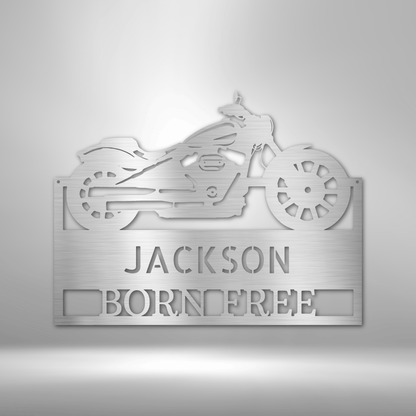 A personalized mechanic metal wall art monogram sign with the name Jackson for a retro garage.