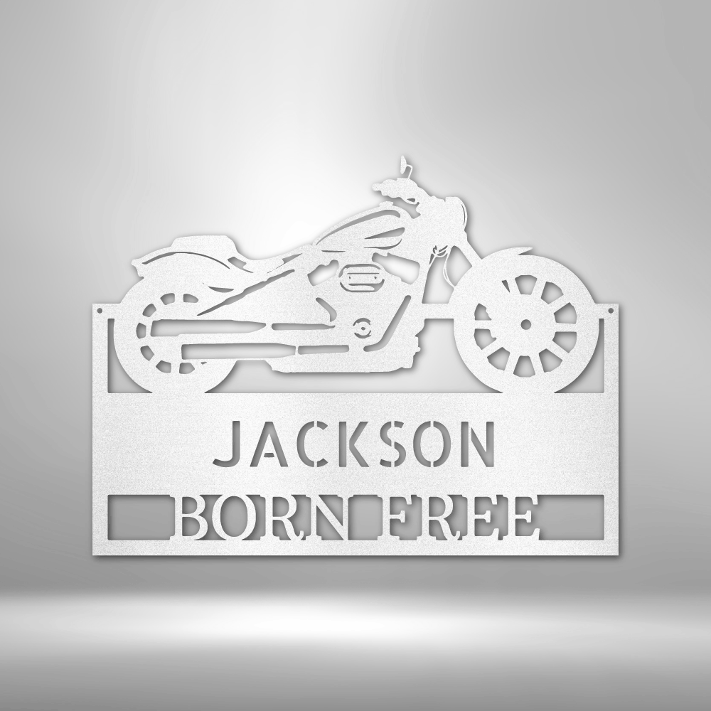 A personalized mechanic metal wall art monogram sign with the name Jackson for a retro garage.