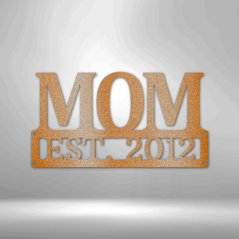 A PERSONALIZED Mother's Day Plaque - Unique Metal Art Gift that says mom est 1954 hanging on a brick wall.