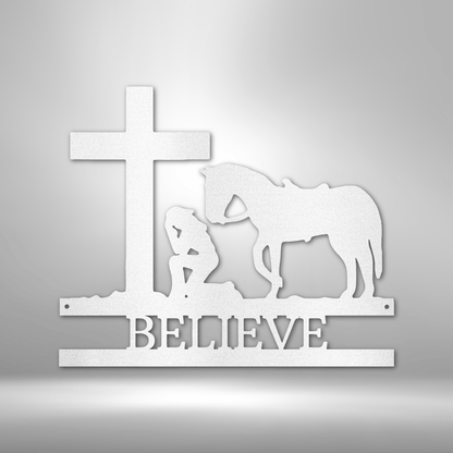 A unique custom handmade metal wall art decor featuring a kneeling cowgirl monogram with the word "believe".