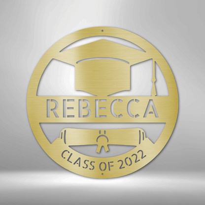 A durable outdoor metal sign with a custom handmade design of a grad cap monogram with the word Rebecca on it.