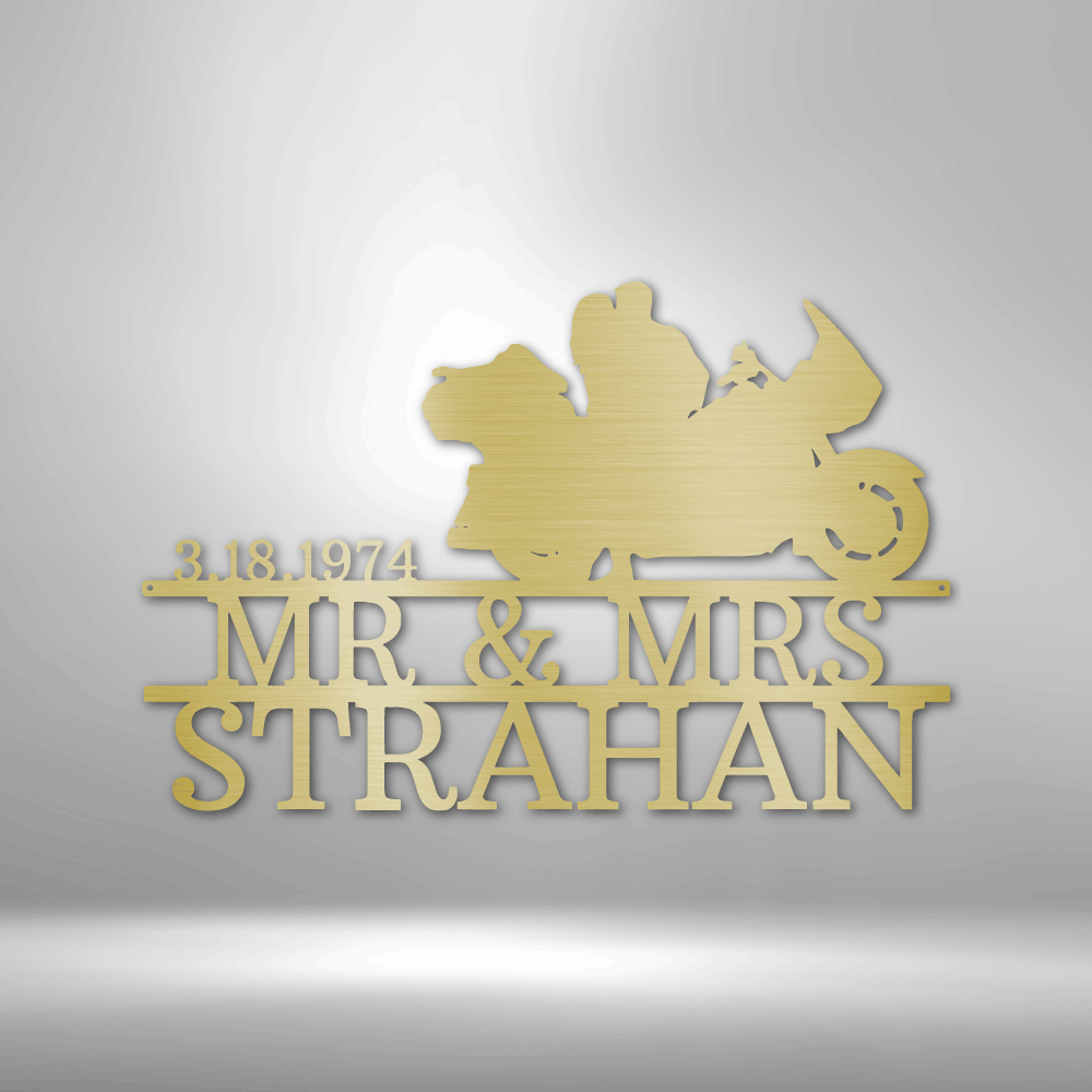 Mr and Mrs Strahan celebrate their anniversary with a personalized steel monogram garage sign.