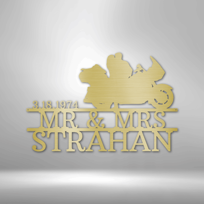 Mr and Mrs Strahan celebrate their anniversary with a personalized steel monogram garage sign.