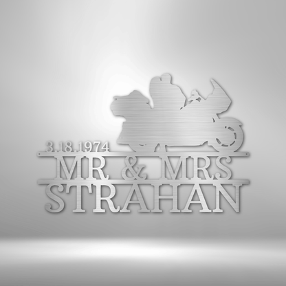 Mr and Mrs Strahan celebrate their anniversary with a personalized steel monogram garage sign.