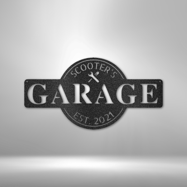 A personalized Steel Monogram Garage Decor sign with an arrow pointing to it.