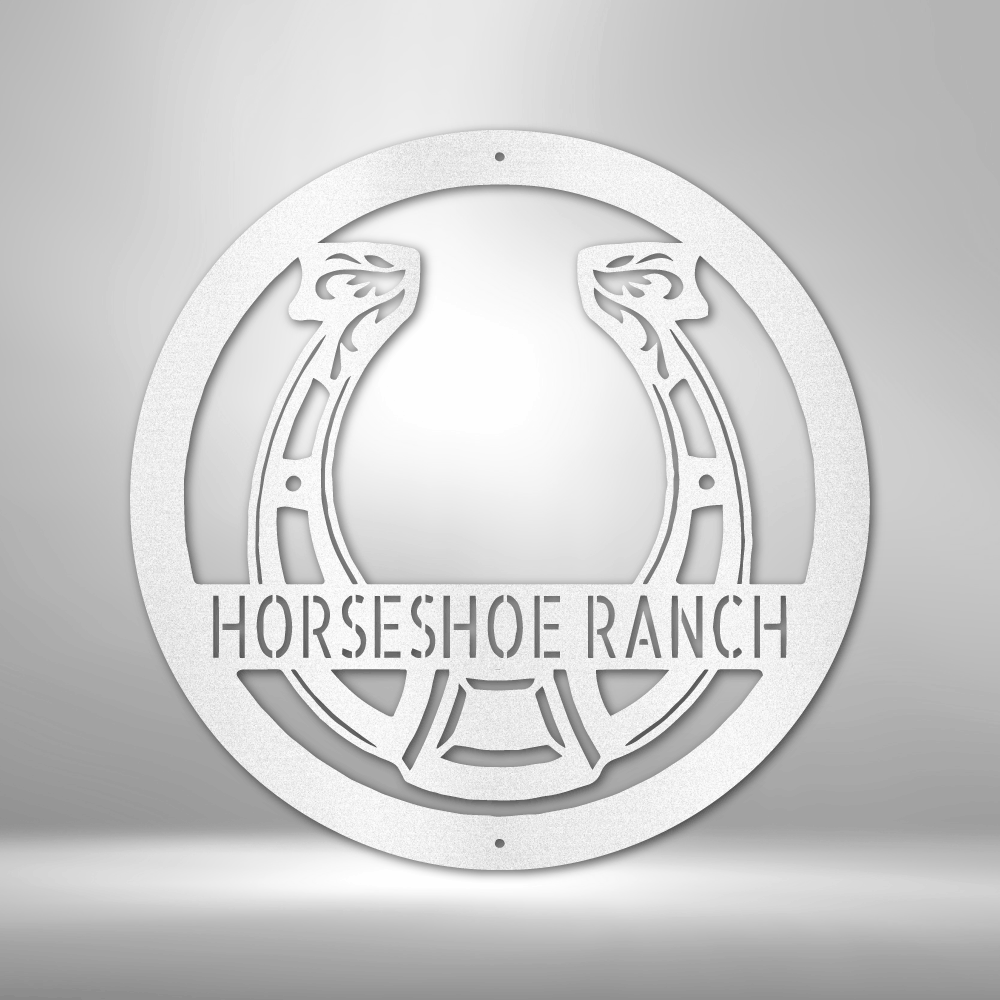 A PERSONALIZED Horseshoe Monogram steel sign with the words zac's ranch, featuring a durable outdoor metal design.