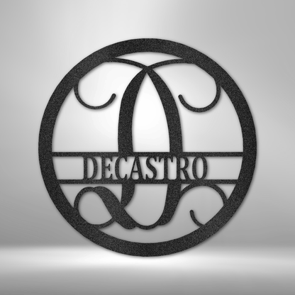 A PERSONALIZED Circle Vine Monogram - Steel Sign with the name decastro hanging on a brick wall as Metal Wall Art Decor