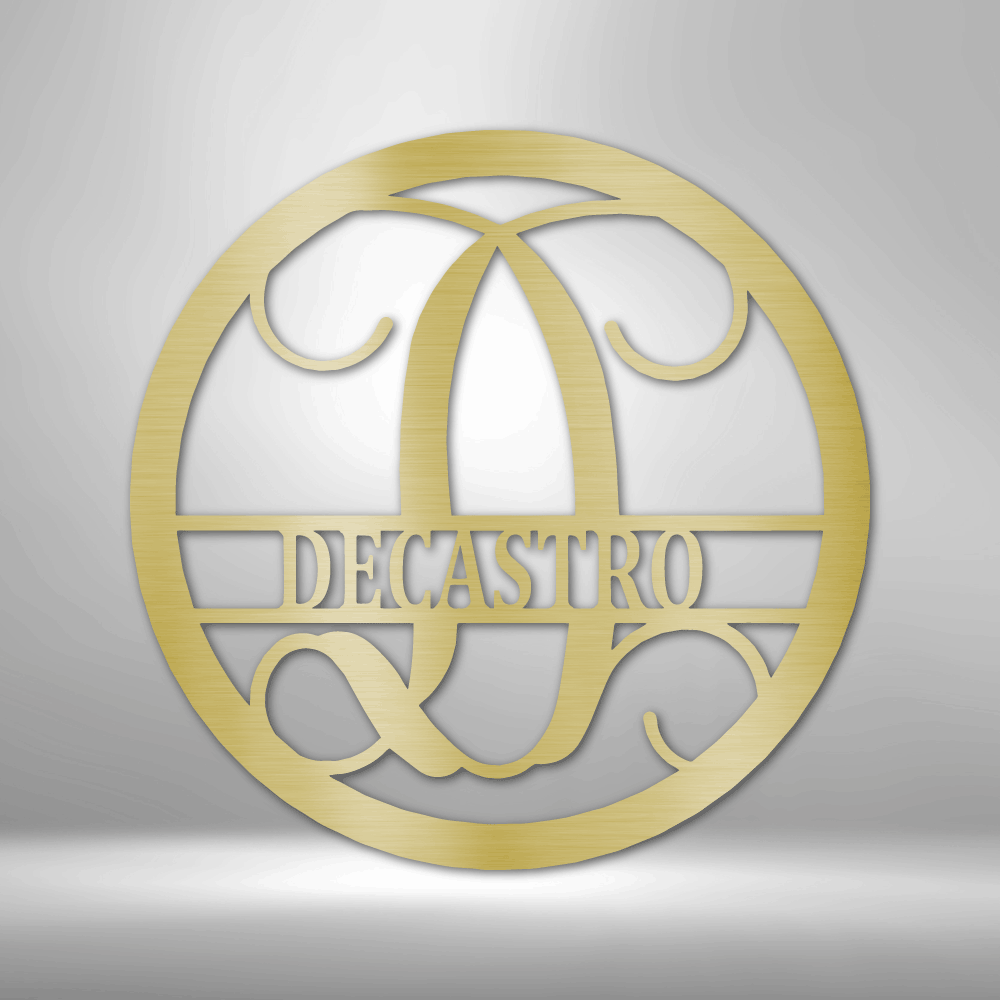 A PERSONALIZED Circle Vine Monogram - Steel Sign with the name decastro hanging on a brick wall as Metal Wall Art Decor